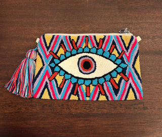 LE POM POM TURQUOISE & RED EYE CLUTCH